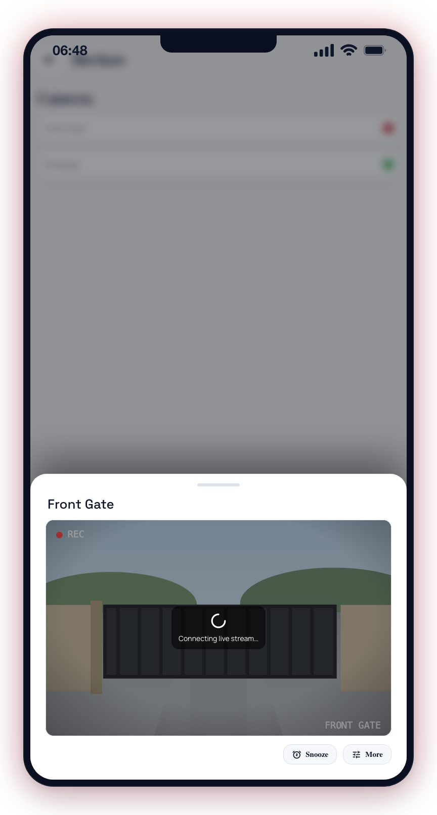 The feed opens in a bottom sheet, showing the snapshot under a Connecting live stream spinner while the stream buffers.