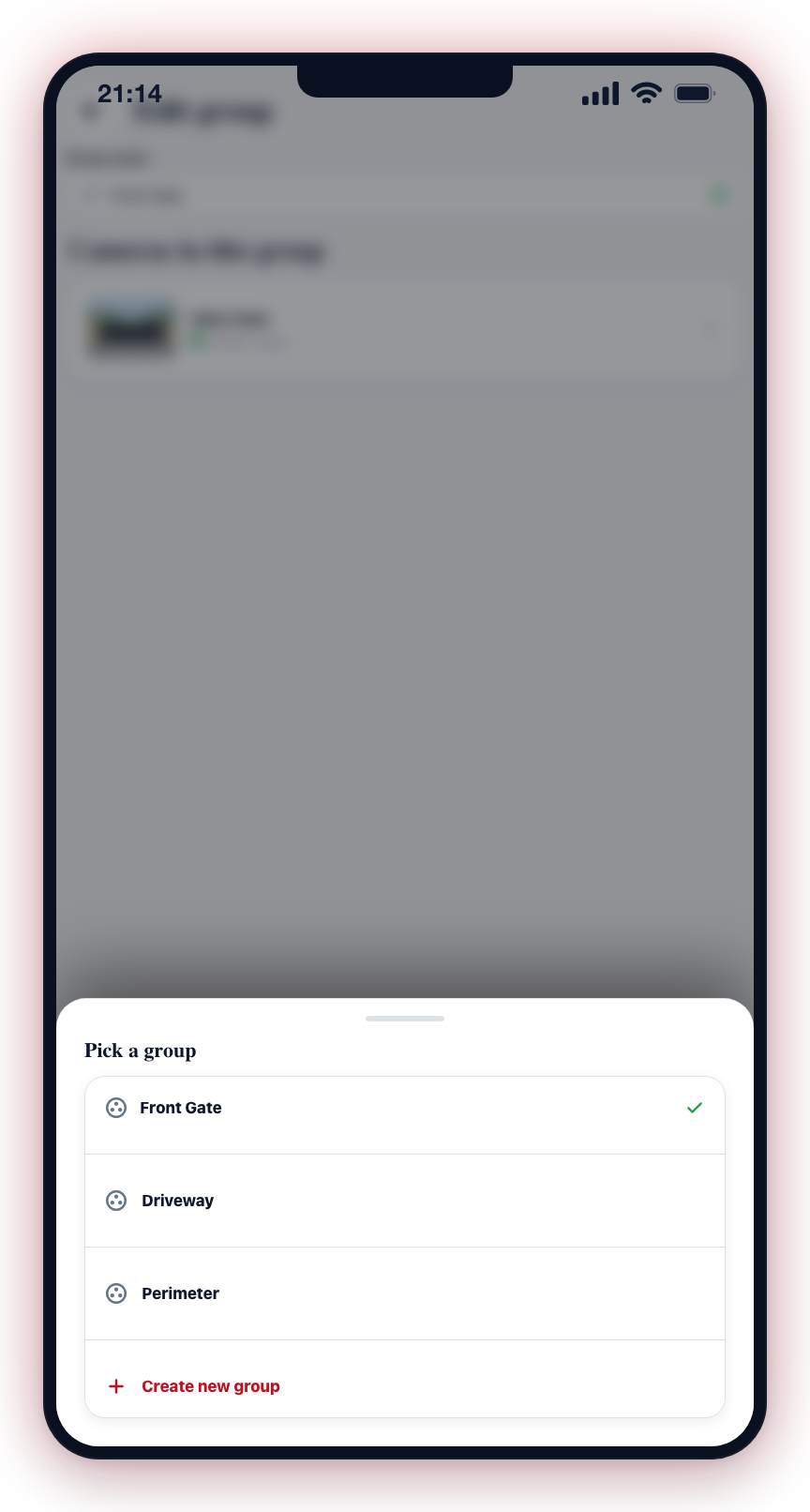 Tap a camera, then pick the group to move it to (or create a new one).