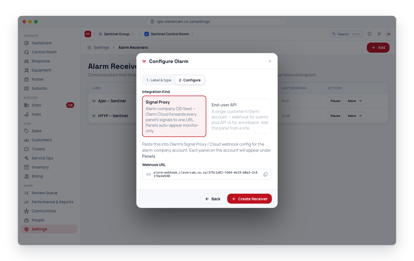 Adding an Olarm receiver in Settings → Alarm Receivers — pick the default input and copy either Webhook URL.