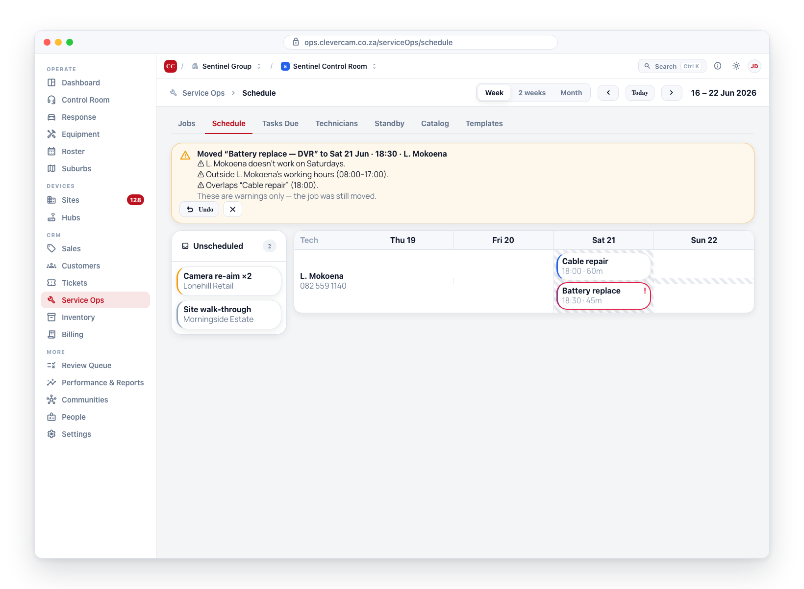 A warning-toned feedback banner lists every condition that tripped — the job is still moved, and the conflicting card is outlined in red.